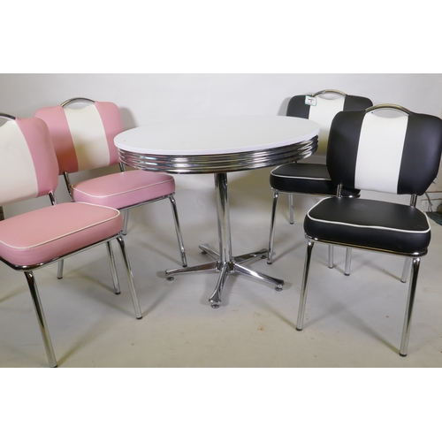 1016 - An American vintage style table and four chairs with chrome frames and vinyl covers, table 90cm diam... 