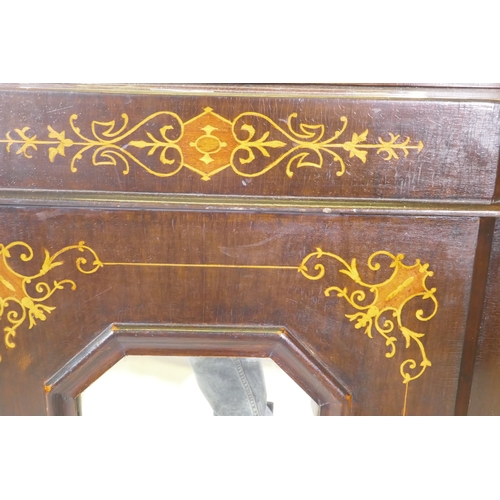 1018 - A Victorian walnut mirror backed chiffonier with breakfront base and three glazed doors, 115 x 30 x ... 