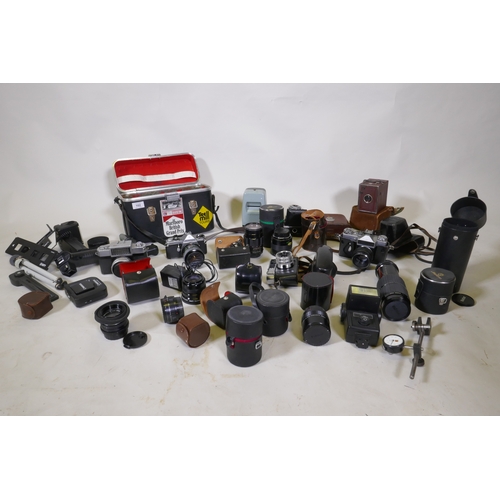 102 - Vintage 35mm SLR cameras and accessories, Nikkorex; Pentax ME; Zenit-E; Halina; Vivitar and Makinon;... 