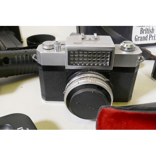 102 - Vintage 35mm SLR cameras and accessories, Nikkorex; Pentax ME; Zenit-E; Halina; Vivitar and Makinon;... 