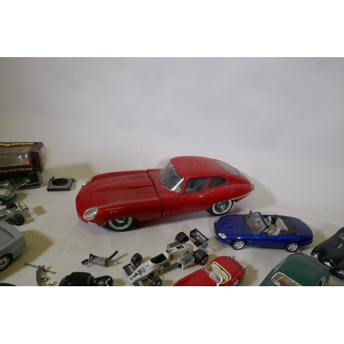 105 - Collectors' die cast model cars, mostly Jaguar, a Monogram models plastic model AF, a Jaguar Masters... 