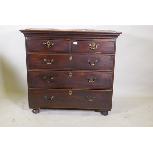 1051 - A Georgian mahogany chest of two over three drawers with moulded fronts and original brass swan neck... 