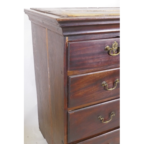 1051 - A Georgian mahogany chest of two over three drawers with moulded fronts and original brass swan neck... 