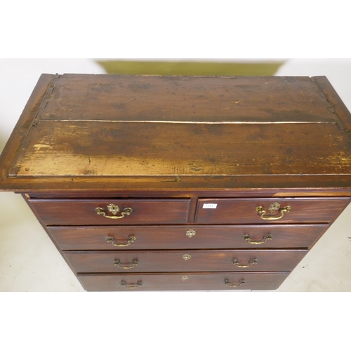 1051 - A Georgian mahogany chest of two over three drawers with moulded fronts and original brass swan neck... 