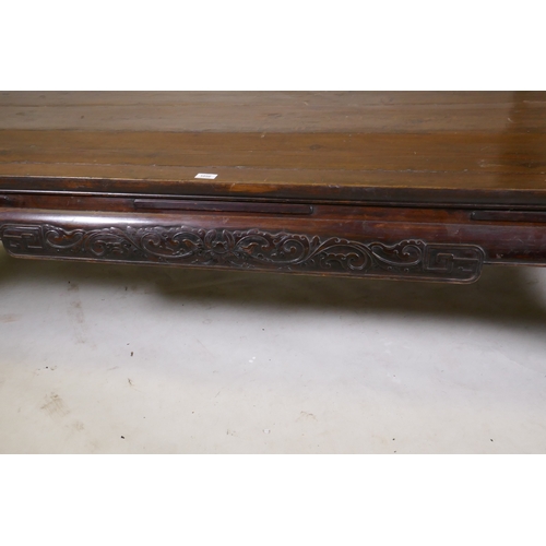 1056 - An antique Chinese soft-wood opium bed, with carved decoration, 198 x 94cm 47cm high