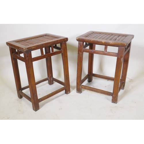 1057 - A pair of Chinese wood stools with bamboo seats, 27 x 38cm, 50cm high