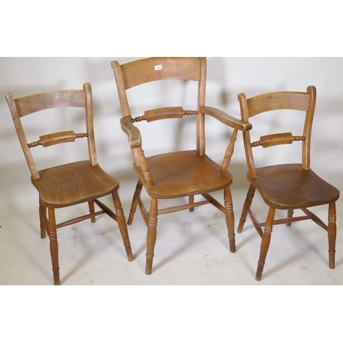 1060 - A C19th Oxford bar back elbow chair and two standards, all with elm seats