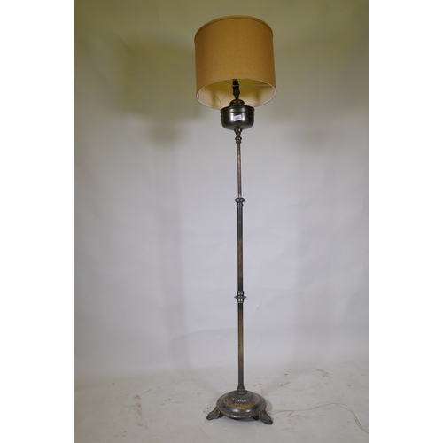 1063 - Antique silver plated telescopic floor oil lamp, converted to electricity, the back stamped EB., app... 