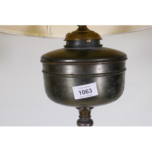 1063 - Antique silver plated telescopic floor oil lamp, converted to electricity, the back stamped EB., app... 