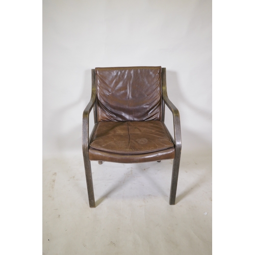 1069 - A laminated open elbow chair with brown leather seat pad and back