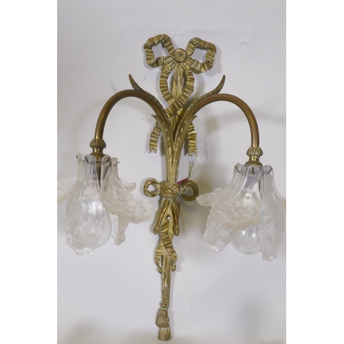 1081 - A set of three brass two branch wall lights with individual etched glass petal shaped shades, stampe... 