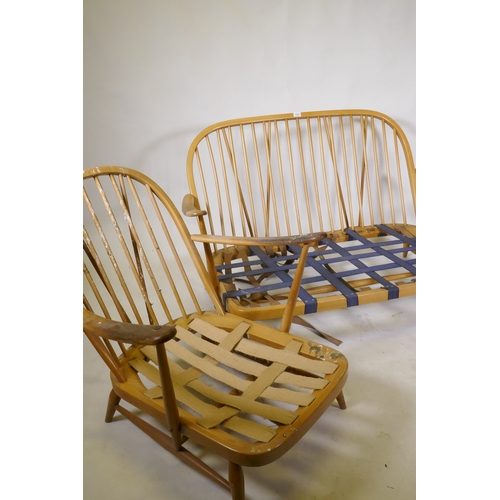 1084 - An Ercol hoop back cottage suite, settee and two arm chairs