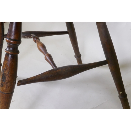 1088 - A C19th yew wood hoop back elbow chair with pierced splat and elm seat, back legs and stretchers, AF