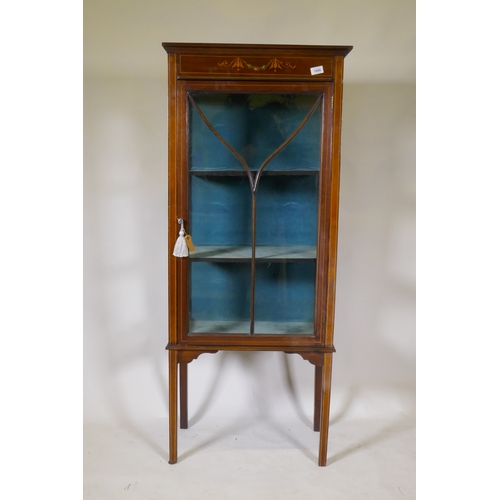 1089 - An Edwardian inlaid mahogany display cabinet with painted decoration and single glazed door, raised ... 