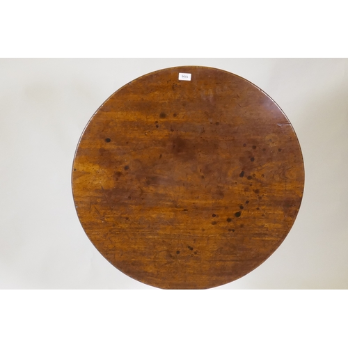 1096 - Georgian mahogany tilt top table, raised on a turned column and tripod supports with pad feet, 78cm ... 