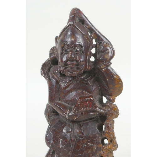 110 - A Chinese carved soapstone figure, 15cm high