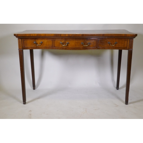 1100 - A Georgian inlaid mahogany serpentine front serving table, with single drawer and two fake, raised o... 