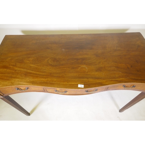 1100 - A Georgian inlaid mahogany serpentine front serving table, with single drawer and two fake, raised o... 