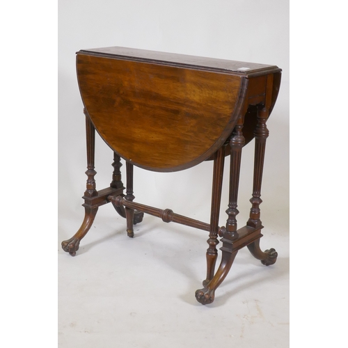 1111 - A fine C19th rosewood Sutherland table, raised on fluted tapering columns and swept supports with pa... 