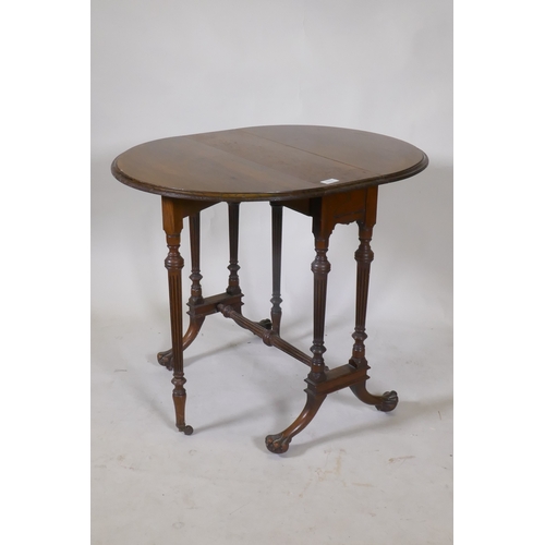 1111 - A fine C19th rosewood Sutherland table, raised on fluted tapering columns and swept supports with pa... 