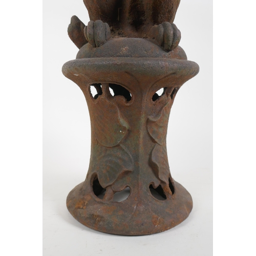 1115 - A Victorian cast iron stick stand formed as a dog on its hind legs, after Coalbrookdale, losses, 55c... 