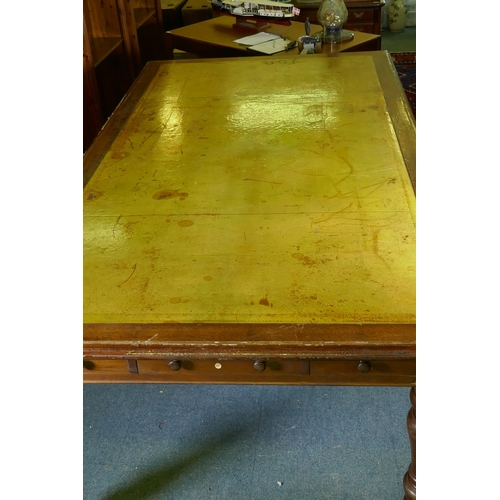 1134 - A large C19th eight drawer mahogany partners library table/desk, with leather inset top, raised on t... 