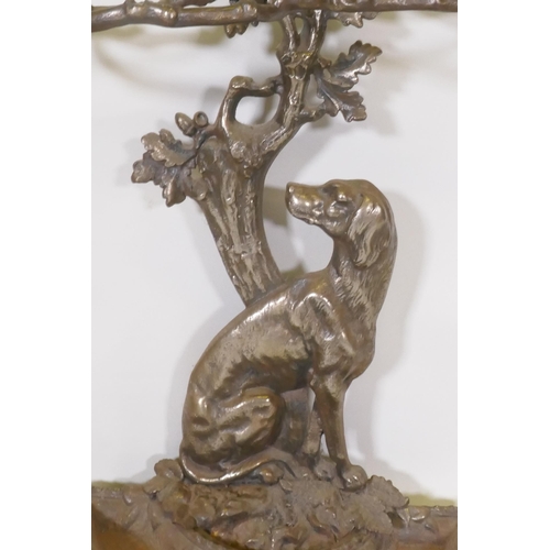 1141 - A Victorian style cast iron stick stand in the form of a seated dog with the legend Cave Canem, 75cm... 