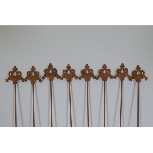 1142 - A set of eight cast iron gothic style plant stakes, 106cm long