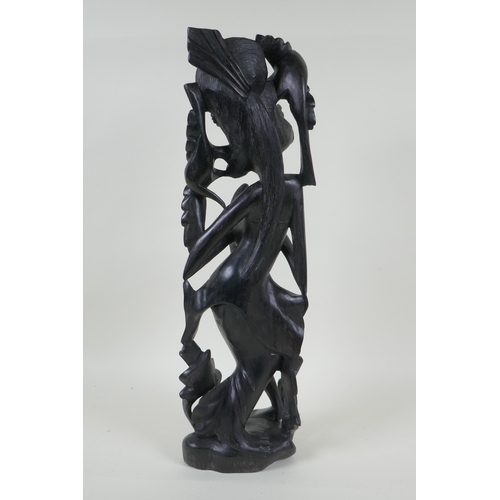 119 - A Balinese carved ebony figure of a dancer, 45cm high