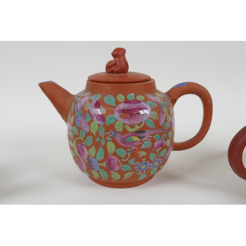 120 - Three Chinese YiXing teapots, one with famille rose enamelled floral decoration, AF, largest 13cm hi... 