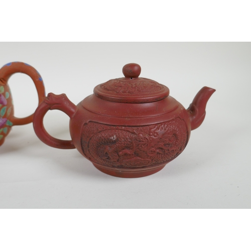 120 - Three Chinese YiXing teapots, one with famille rose enamelled floral decoration, AF, largest 13cm hi... 