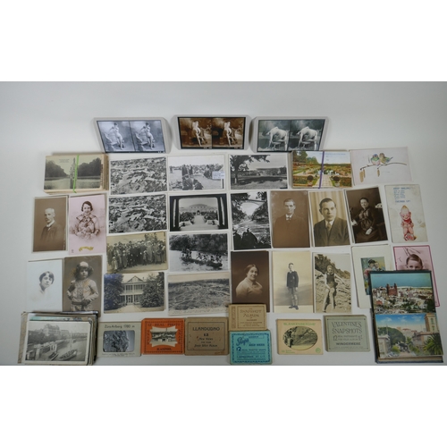 129 - A quantity of early C20th and later postcards, and snapshot albums, mostly topographical, largest 17... 