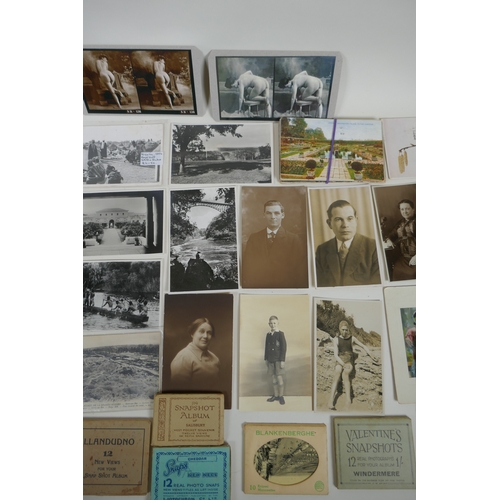 129 - A quantity of early C20th and later postcards, and snapshot albums, mostly topographical, largest 17... 