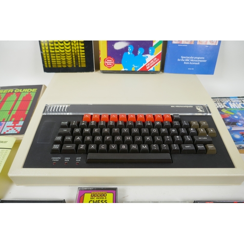 13 - A 1980s Acorn BBC micro computer model B in original box, with manuals, user guides, Chess and Star ... 