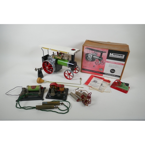 14 - A Mamod T.E.1 traction engine, boxed, an E.S.L. 4 volt battery and matching 4 volt motor, 25cm long