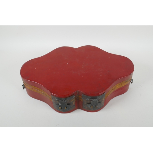 152 - A Chinese red lacquered wood box with metal mounts, 40 x 25cm