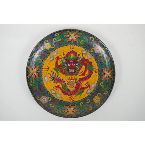 153 - A Chinese cloisonne dish, with dragon and lotus flower decoration, the base decorated with bats and ... 