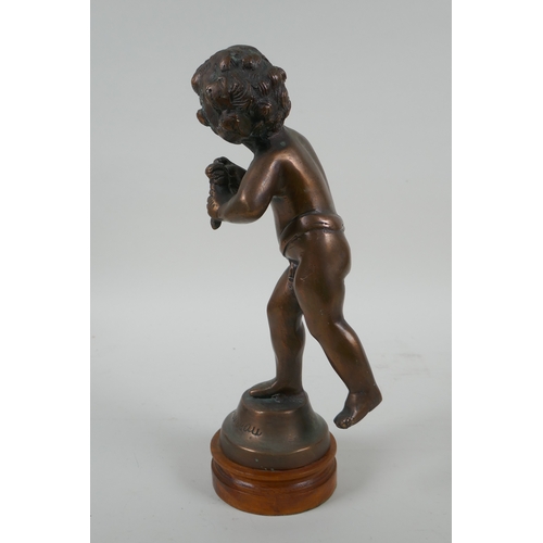 155 - After Auguste Moreau, (French), a bronze figure of a putto, 27cm high