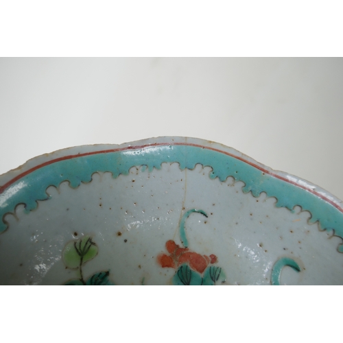 158 - A C19th Chinese porcelain dish with frilled rim and famille rose enamel floral decoration, AF, 18cm ... 