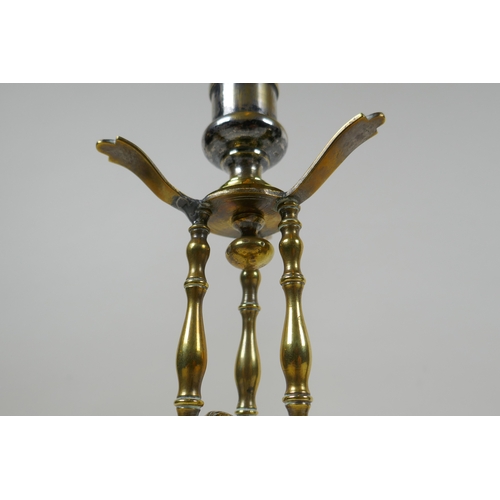 159 - An antique brass candle stick with putto decoration, together with an Art Nouveau style bronzed cast... 