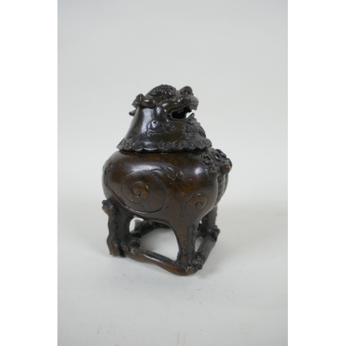 161 - A Chinese bronze censer in the form of a kylin, impressed 4 character mark to base, 12cm high