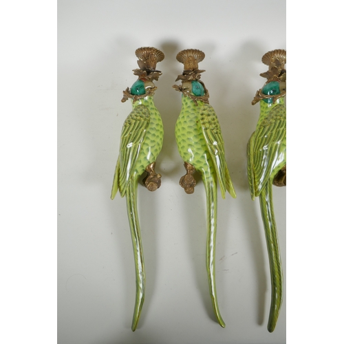 162 - Two pairs of polychrome porcelain and gilt metal parrot wall sconces, 47cm high, 1AF