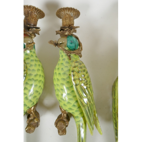 162 - Two pairs of polychrome porcelain and gilt metal parrot wall sconces, 47cm high, 1AF