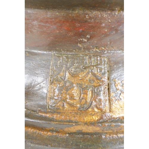 190 - A Sino Tibetan gilt bronzed metal figure of Buddha, 4 character mark to the reverse, 27cm high