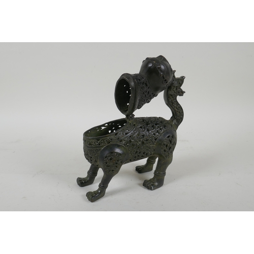 199 - A Persian pierced bronze lion censer and cover, 18cm high