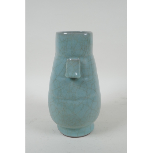 204 - A Chinese celadon ge ware vase with two lug handles, 22cm high