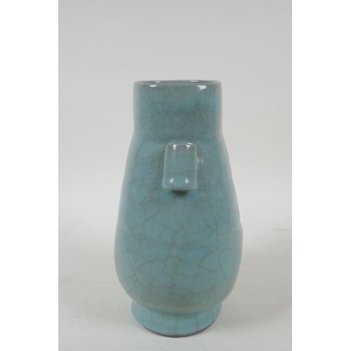 204 - A Chinese celadon ge ware vase with two lug handles, 22cm high