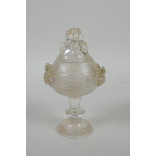 207 - A Chinese moulded glass stem cup/censer and cover with kylin decoration, 15cm high