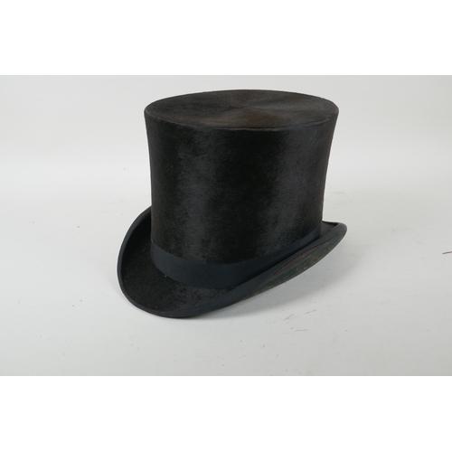 209 - A top hat by W. Mackintosh of Berkeley, interior 16 x 20cm