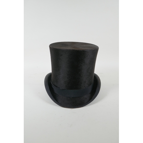 209 - A top hat by W. Mackintosh of Berkeley, interior 16 x 20cm